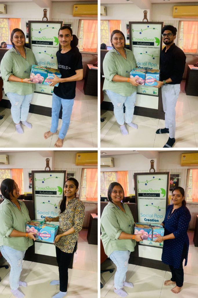 Happy CrossShore Infotech employees enjoying the mango season celebration, reflecting workplace culture and appreciation.